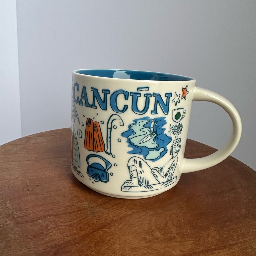 Starbucks Cancún Mug with Blue and Cream Design.